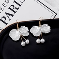 Elegant white petal drop earrings with gold hooks and pearl accents on a tray - White Petal Pearl Tassel (E1929/Steel Needle)