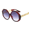Lunettes de soleil octogonales écaille avec branches dorées à motif grec et verres violets - Monture Écaille Rouge Verres Gris Dégradé