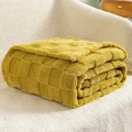 Thickened mustard yellow checkered plush blanket with soft fleece texture on sofa - Yellow