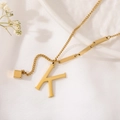 Elegant gold titanium necklace featuring a letter K pendant with unique bar link chain - Gold Initial K (8847)