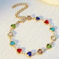Colorful heart-shaped crystal bracelet with gold chain under natural warm sunlight - Heart / KC Gold Multicolor