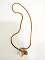 Golden flat snake chain necklace featuring heart pendant, pearl, and toggle clasp - Letter Y