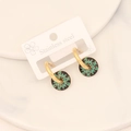 Detail of stainless steel earrings with gold plating and green sunburst enamel charm - Gold Green Black Sun Pattern (5#)
