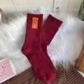 Chaussettes mi-mollet bordeaux en coton avec texture côtelée et patch sourire orange - Taille unique / Bordeaux