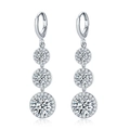 Silver teardrop earrings with three graduated cubic zirconia round pendants and loop clasp - Earrings / White