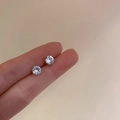 Elegant six-prong silver stud earrings featuring round brilliant cut clear cubic zirconia - Silver Zircon-4mm