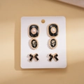 Ohrring-Set mit schwarzem Emaille, Perlenanhängern und Schleifen-Steckern für Damen - Silberstift - Schwarz (6er-Set/3 Paare)