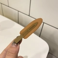 Detail of candy color matte hair clip featuring earthy yellow and light brown color blocks - Jelly Seamless Clip / 6.7cm / Light Coffee