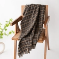 Classic brown plaid scarf with fringe draped on a wooden chair, soft cashmere-like texture - Khaki Brown