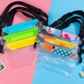 Waterproof large PVC waist bag with adjustable strap and multi-seal closure in neon cyan - Transparent Upgrade