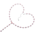 Detail showing elegant silver necklace with pink heart gems arranged in a heart shape - White Gold Pink Diamond Necklace