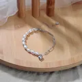 Bracelet en argent 925 avec perles baroques et pendentif coeur de style français minimaliste - Argent 925 / Platine / Perle Naturelle