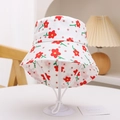 Detail of white cotton baby sun hat featuring red floral patterns and brown polka dots - Red Large Flowers