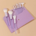 10-piece purple makeup brush set with matching PU leather case on a beige background - Large Candy Purple / 10 Pcs + Leather Bag
