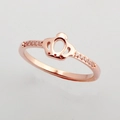 Fashionable rose gold crown ring with sparkling micro-pave cubic zirconia accents - US 5 / Rose Gold