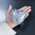 Silver heart-shaped disco ball ornament held in hand for party decoration - 8cm / Silver