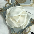 Detail of pure mulberry silk skinny scarf in ivory white on a vintage mirror tray - 15x150cm / White
