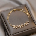 Elegant gold plated bracelet with three opal butterflies and sparkling rhinestones - Butterfly Artificial Cat's Eye Stone Bracelet (63#) / Gold
