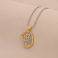 Macro shot of silver ball chain with gold letter E pendant encrusted with clear crystals - Letter E