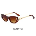 Lunettes de soleil punk ovales rétro avec verres thé et branches dorées pour femmes - Monture Thé Verres Thé Dégradé