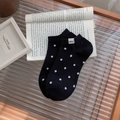 Chaussettes courtes noires en coton à pois blancs avec une petite étiquette 'Nice' - Taille unique / Noir