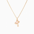 Macro detail of golden Saturn necklace with pink stone planet pendant and star charm - Single Piece / Rose Gold / Pink Planet