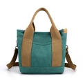 Green vintage canvas tote bag with contrast brown straps and adjustable shoulder strap - Lake Green