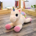 Regenbogen Einhorn Kuscheltier in Cremeweiß mit rosa Hufen in liegender Position - 40cm (0.18kg) / Rosa