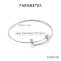 Brazalete minimalista de acero inoxidable plateado con bola y diseño ajustable - Color Acero