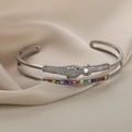 Silver leopard head open bangle with zircon embellishments on beige silk background - One Size / Silver