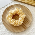 Cute yellow and white checkered scrunchie displayed on a minimalist wooden tray - Light Yellow Plaid