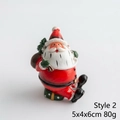 Resin Santa Claus figurine No. 2 sitting on gift box, size 5x4x6cm for Xmas decor - Style 2 (Santa Sitting on Gift Box)