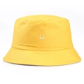 Bright yellow cotton bucket hat with a minimalist white embroidered smiley face on front - One Size (56-58cm) Non-adjustable / Yellow