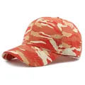 Outdoor camouflage baseball cap in vibrant orange and red tones with a curved brim - Orange Camouflage