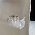 Silver textured open ring with Chanceux engraving and irregular wavy edges design - Wave Lettering