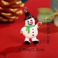 Detailed view of resin snowman pendant with 4.1cm height and 2.3cm width measurements - Snowman with Green Scarf
