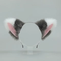 Handmade plush cat ears headband in grey white and pink faux fur on a display stand - One Size / Folded Fox Ears - Dark Grey White