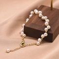Elegant natural pearl bracelet with 18k gold plated beads and adjustable lobster clasp - White Baroque Freshwater Pearl
