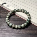 Handcrafted green bodhi seed bracelet with cat paw carving on vintage calligraphy scroll - Star Moon Green Skin Old Style