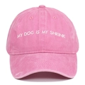 Close-up of MY DOG IS MY SHRINK embroidery on a pink washed cotton baseball cap - Pink