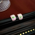 Detail of elegant gold-plated tulip earrings with pink enamel finish on dark velvet - Silver Pin - Pink Tulip Square Stud Earrings