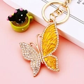 Exquisite golden butterfly keychain with white crystals and yellow enamel wings - Yellow Pattern Butterfly