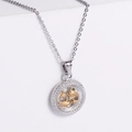 Collier signe Poissons bicolore avec icône de poisson dorée sur pendentif rond argenté - Poissons