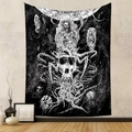 Detail of bohemian skull tapestry with cosmic planets and tentacles on a textured grey wall - 73X95CM / Brushed Fabric