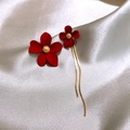 Detail of red flower earrings with gold beaded centers and asymmetric tassel chains - Style 14 Silver Needle-Gold-Red