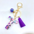 Letter T resin keychain with colorful stones, purple tassel and golden metal hardware - Letter T