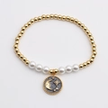 Bracciale bohémien con perline dorate, perle bianche e ciondolo luna e stelle - Ciondolo Luna e Stella / Oro
