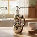 Aceitera de cerámica con relieve de pájaro y bayas, botella de 600ml y vertedor - Patrón de Bayas y Pájaros
