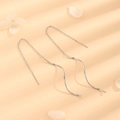 Elegant silver wavy threader earrings in stainless steel with long tassel design - Silver