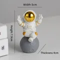 Modern astronaut figurine in white and gold with moon base, dimensions 5x7.9x4cm - Small Gold-edged Model C